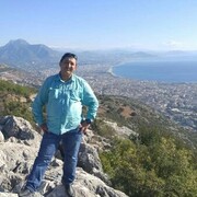  ,  Ali, 54
